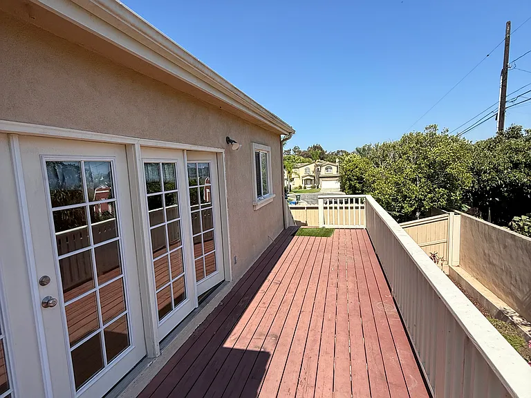 french doors from family room open to back deck
