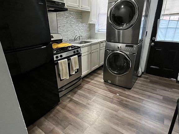 Washer is no longer In kitchen it is upstairs