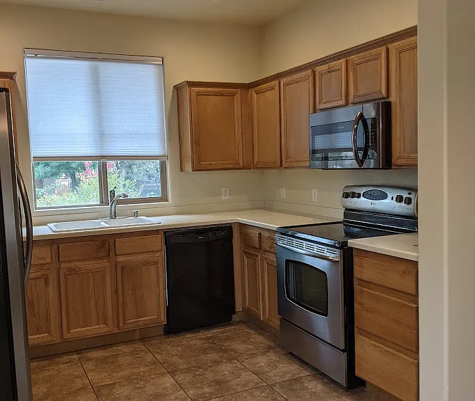 Kitchen right. 
*New Blinds installed. Not shown in photo.