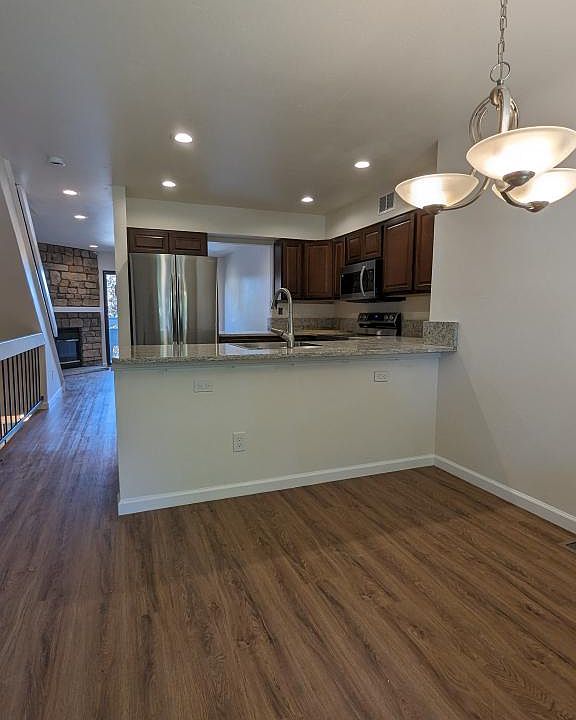 View of dining room and open kitchen