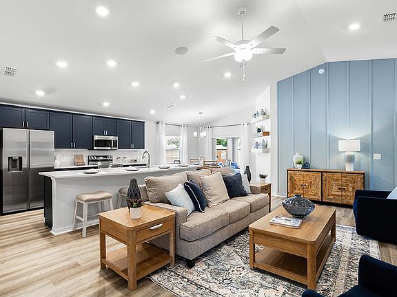 This popular 1,715 sq. ft. home plan includes a sunny open-concept layout - Parker II by Highland Ho