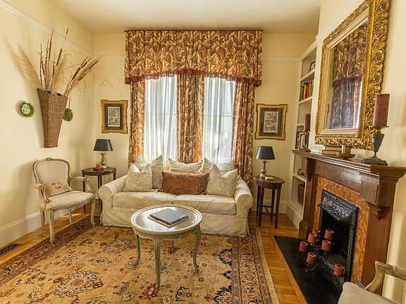 Super sunny living room with 10 foot ceilings.