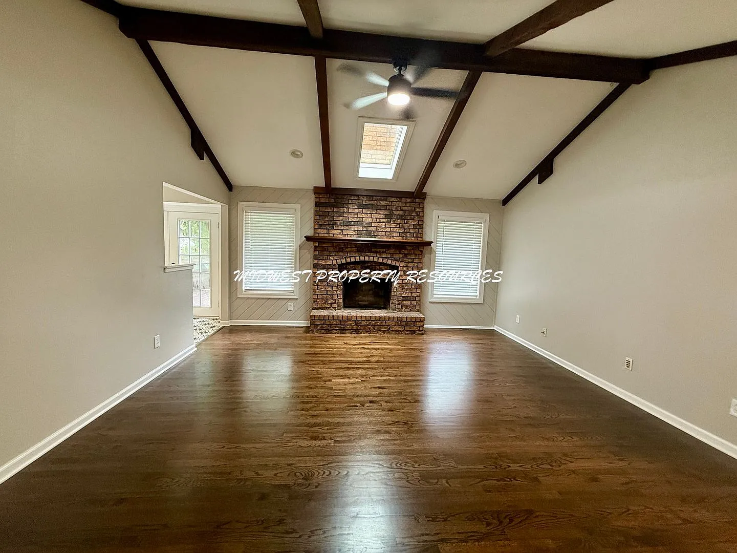 Newly Remodeled 3 Bed, 2.5 Bath Home with Vaulted Ceilings, Finished Basement & Fenced Yard! — Photo 3