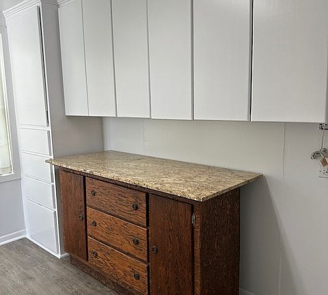 Chest for folding clothes with cabinets for storage