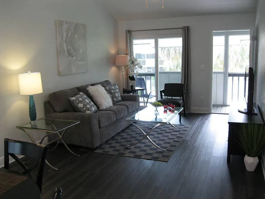LIVING ROOM TO LANAI, CORTEC VINYL FLOORING THRU-OUT