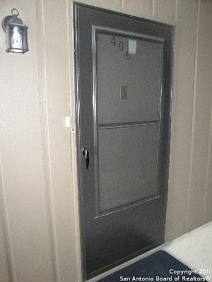 2nd image of 8702 Village Dr #406