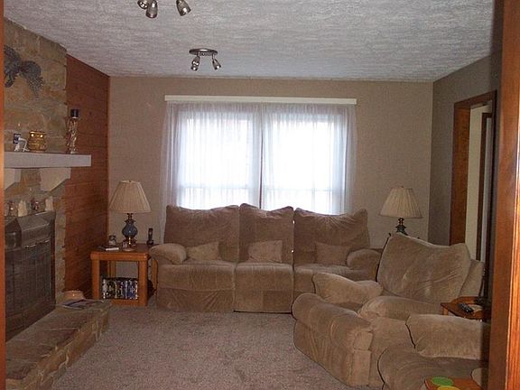 14 x 10 Family Room with new carpet and updated lighting.