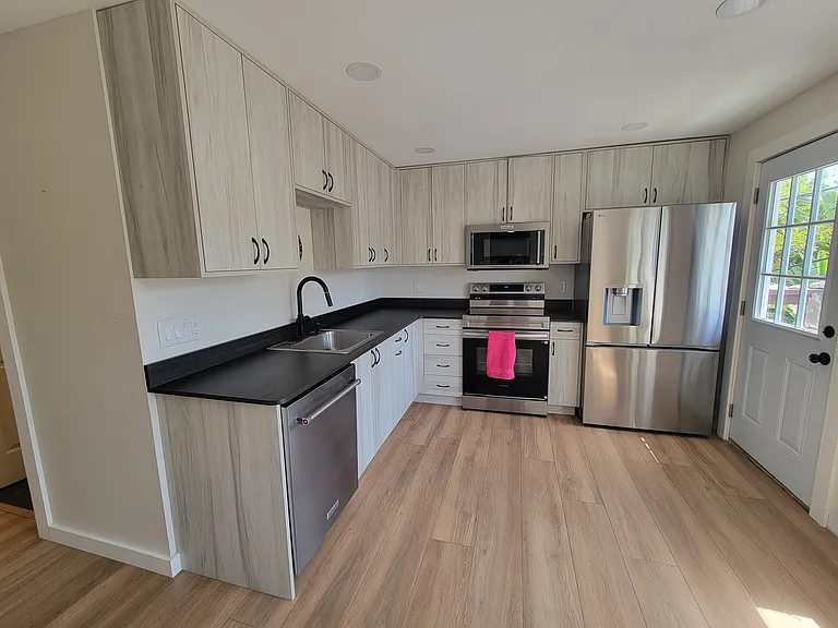 Newly updated kitchen. New appliances including dishwasher