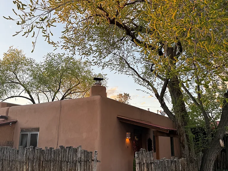 Classic Santa Fe Adobe with private entry and dedicated parking.