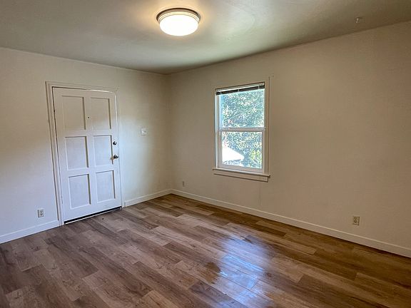 Living room looking back towards front door.