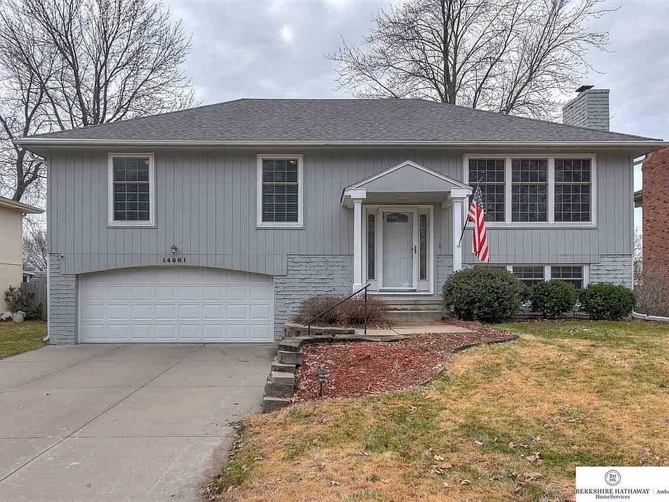 All new windows, new trim and doors.  Newer driveway! Newer a.c.  Attic storage.  Wait until you see the storage in the garage.