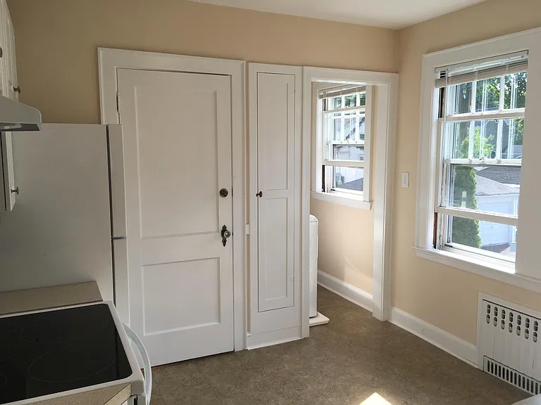 Kitchen showing entrance to pantry