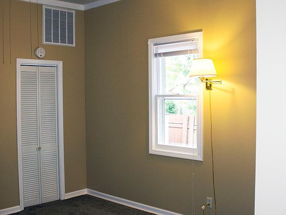 Bedroom with new carpet and new paint.