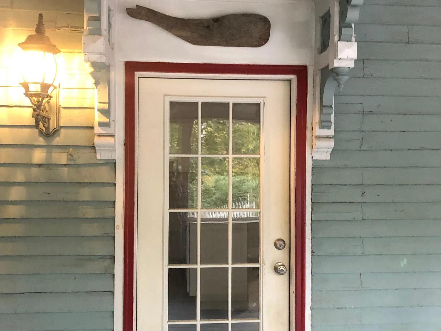 Enter the kitchen through the porch.
