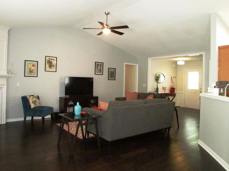 Huge open concept living room with vaulted ceilings