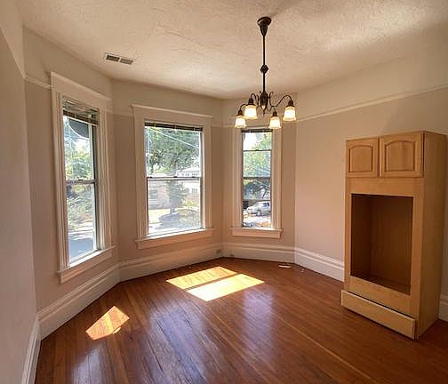 Bdrm #1: front bdrm w/ bay window