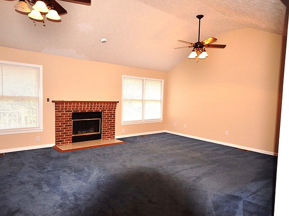 view of great room w/ fire place