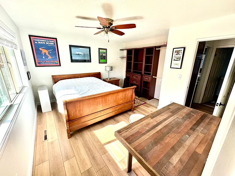 Master bedroom, facing east-backyard, with desk