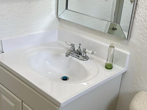 New bathroom vanity, new mirror and new medicine cabinet!