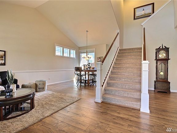New laminate floors compliment this open entry