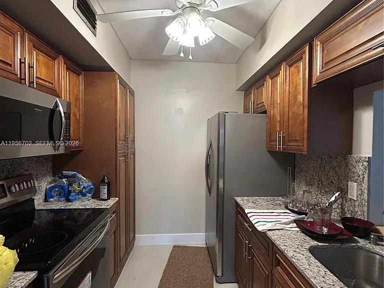 270 NE 191st St #101 — Photo 9
