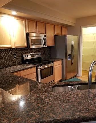 Kitchen with granite counter tops and large pantry
