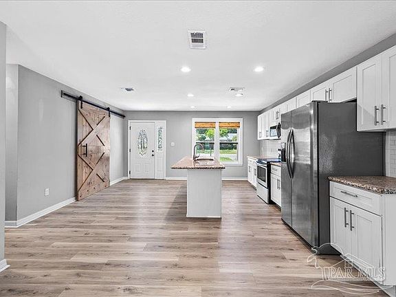 3rd image of 318 N 57th Ave