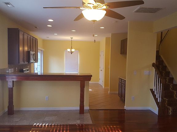 LIVING ROOM LOOKING INTO KITCHEN