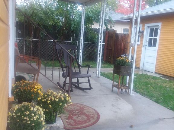 Back porch with privacy fence. Door access to garage.