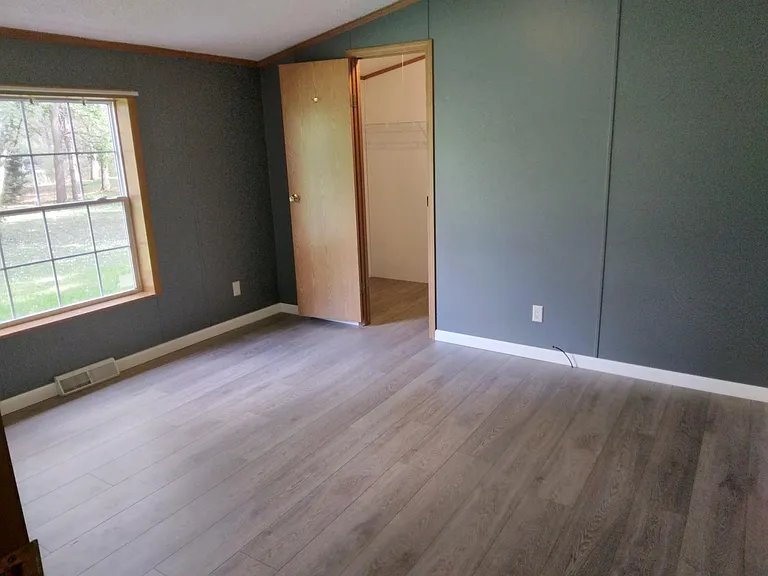 Bedroom #2 with walk in closet.
