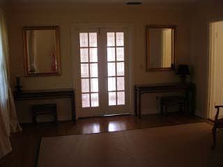 Charming l.r. french doors lead to study/den/family room.