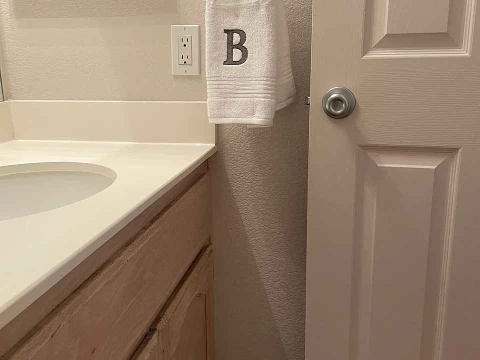 1 of 2 bathrooms. Two full bathrooms, including a private en-suite in the primary bedroom.