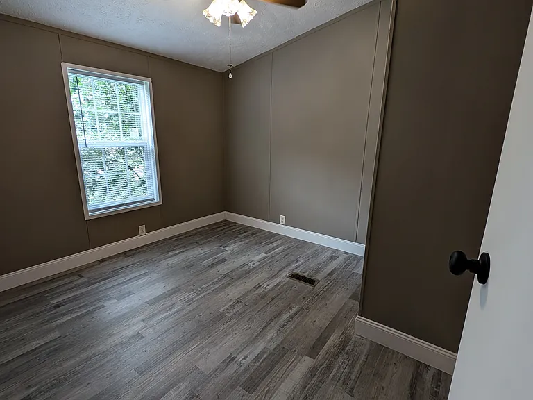 Bedroom 3 with closet and window and ceiling fan