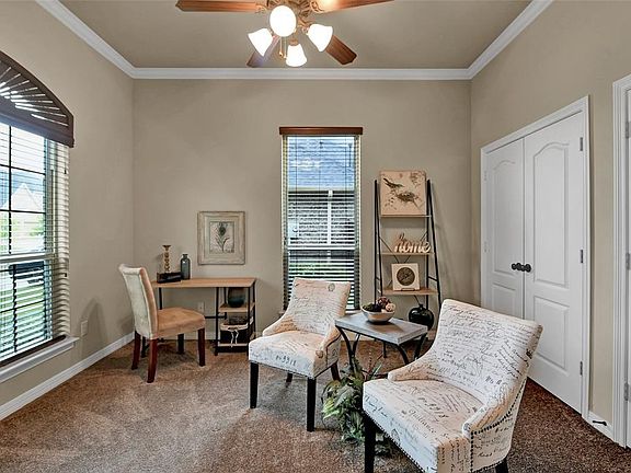 Study downstairs functions as a beautiful study or a secondary living area down across the hall from the secondary master suite downstairs!