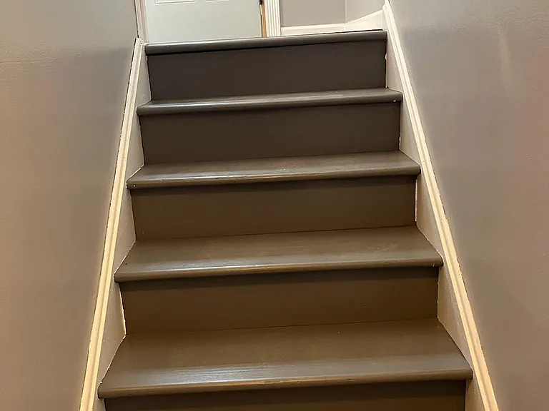 Stairway going up to front door