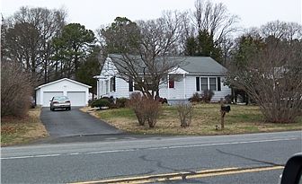 Front of Home showing garage.