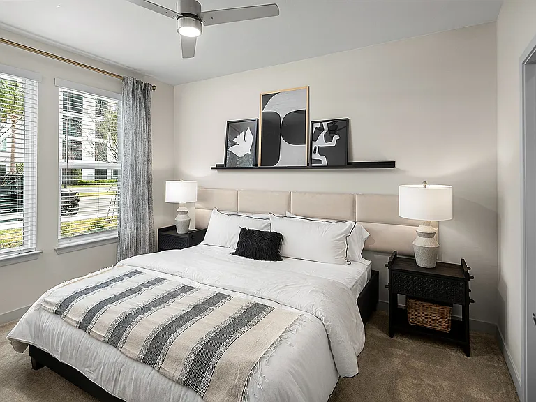 Cozy Primary Bedroom with Large Windows