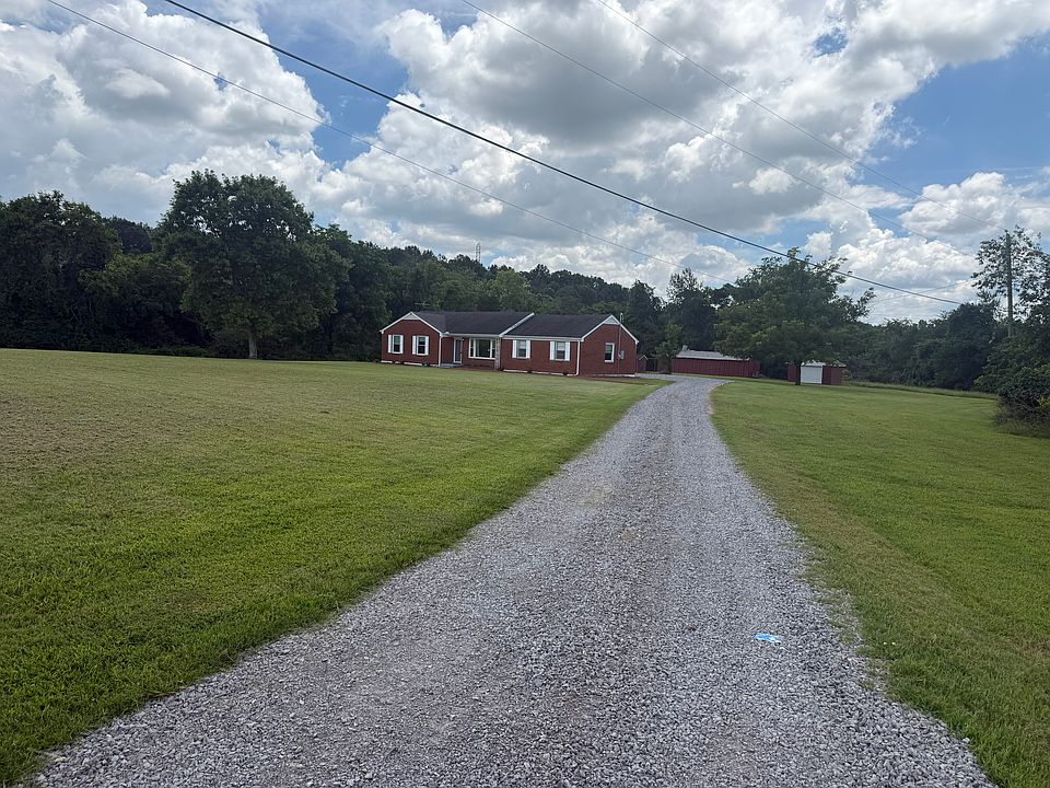 House sits 50 yards off main road.