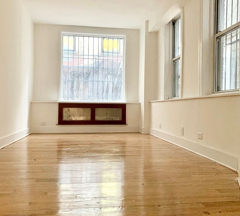 1st image of 122 E 61st St APT B