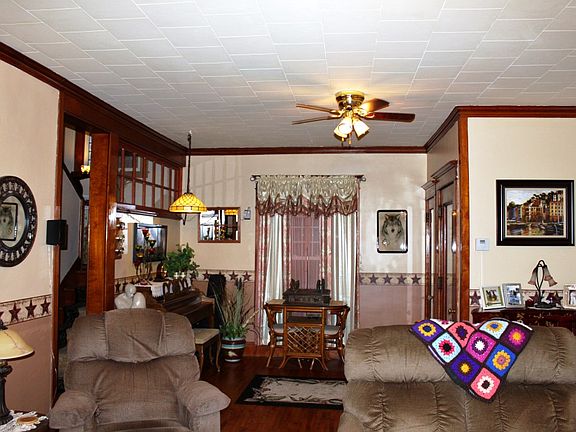 Living room includes very nice foyer