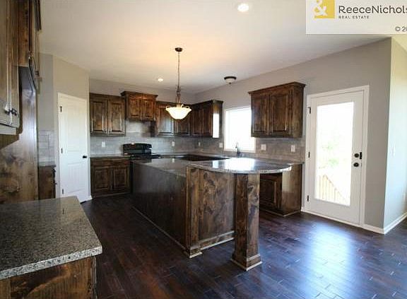 Large Kitchen with Tiered Island