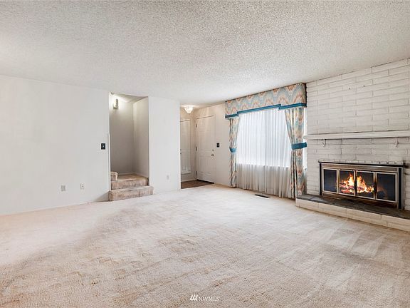 Living Room with wood fireplace>