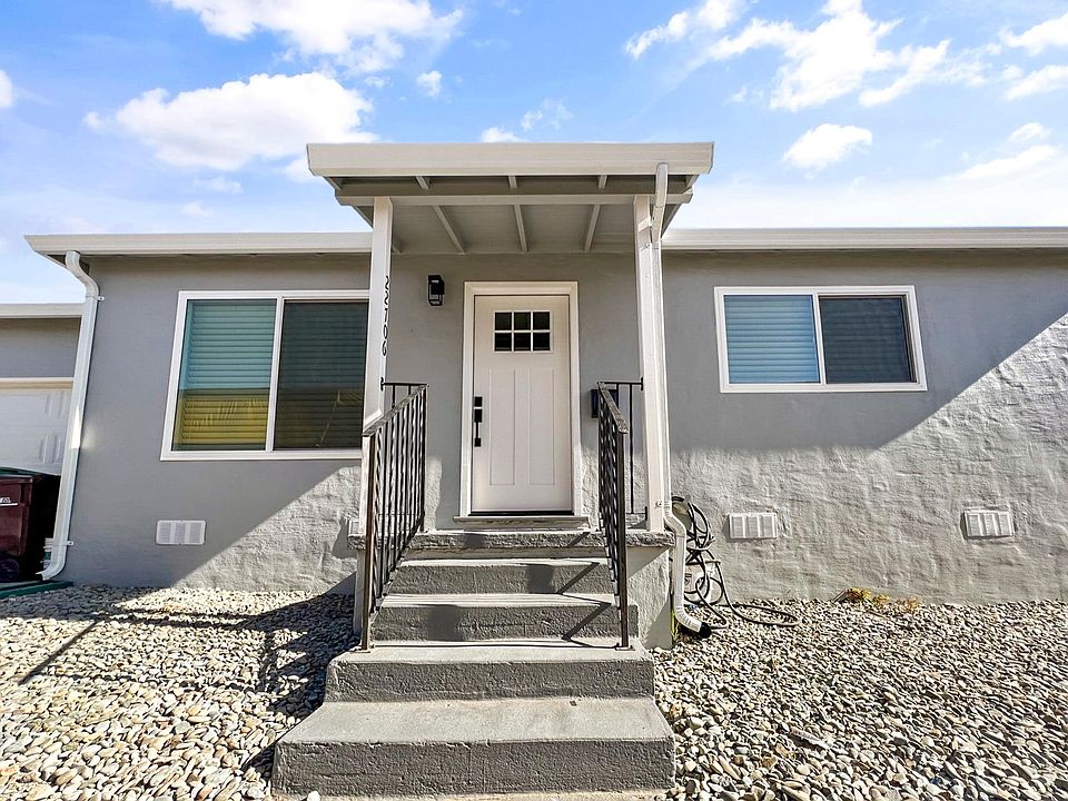 Unit #3 Front Door Entrance with modern LED exterior lights