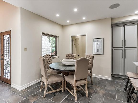 Separate breakfast area beside the kitchen. The door behind this area has washer/dryer connections but can also be converted to a large walk in pantry for even more storage.