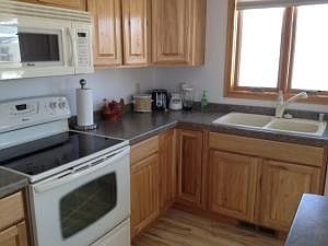Roomy Kitchen With Deck Sliding Doors