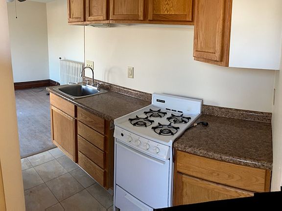 Kitchen with counter work space and cabinetry for storage