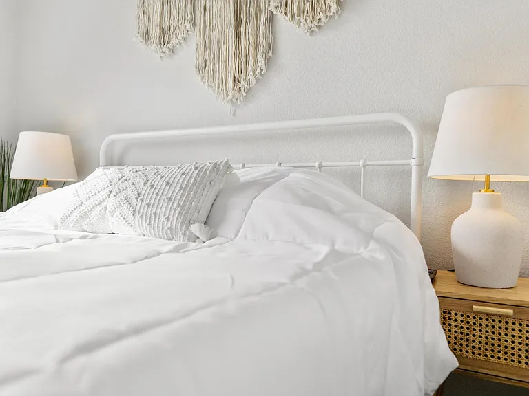Bedroom with view of San Diego Harbor and queen-sized bed