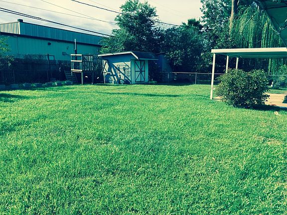 Huge back yard with shed/patio