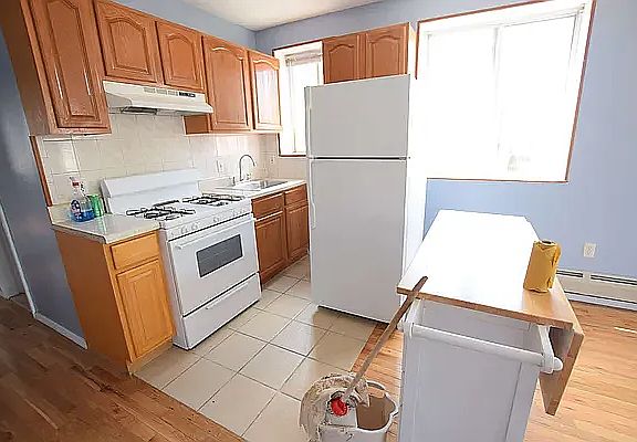 5th image of 1122 Herkimer St #2L