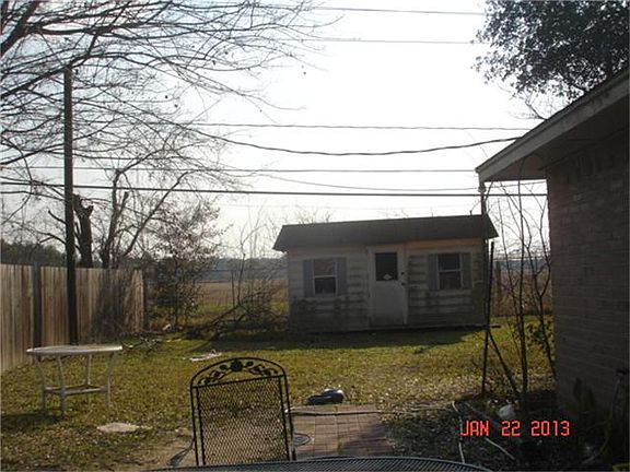 Good sized fenced backyard with shed with electricity hooked up.